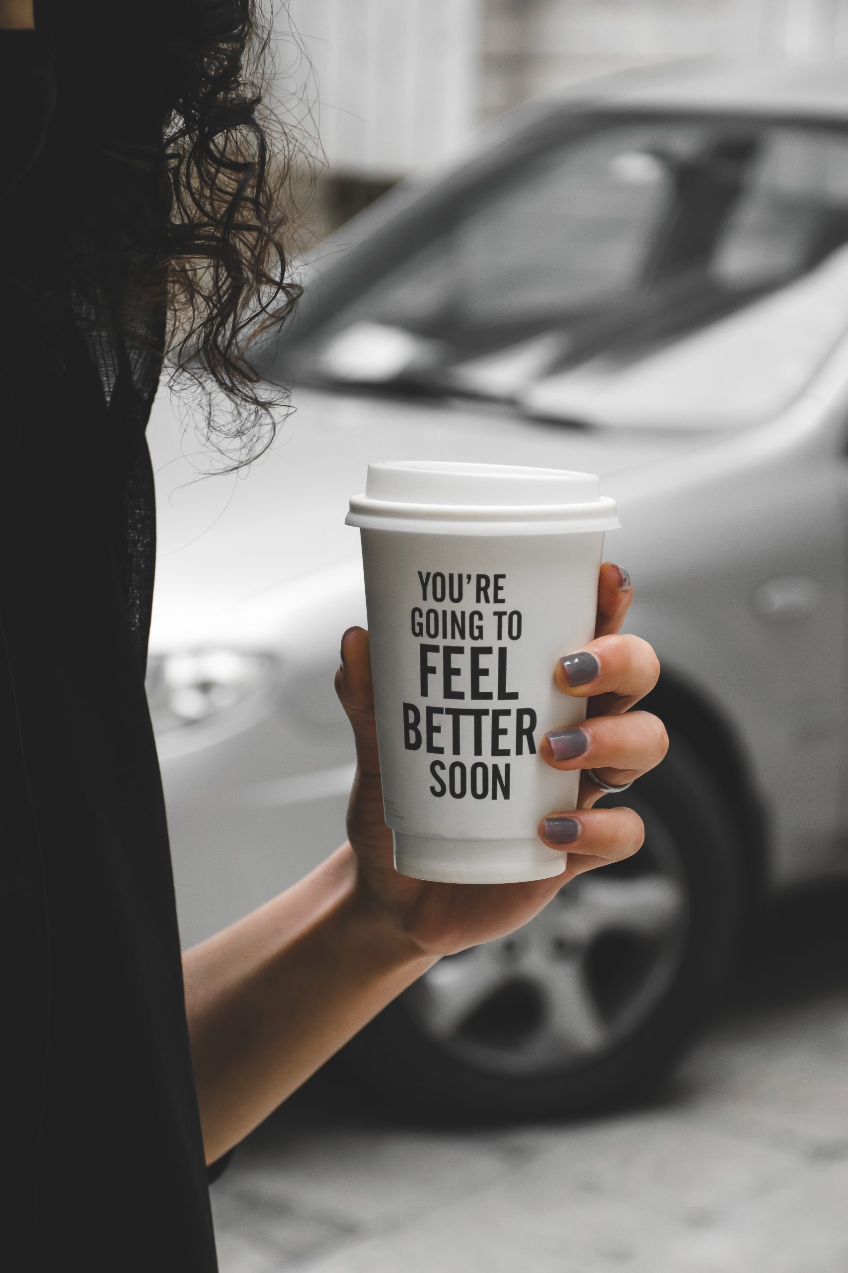 Hope and healing are possible Smiling woman holding a cup with the message "You're going to feel better soon," symbolizing hope and functional wellness coaching