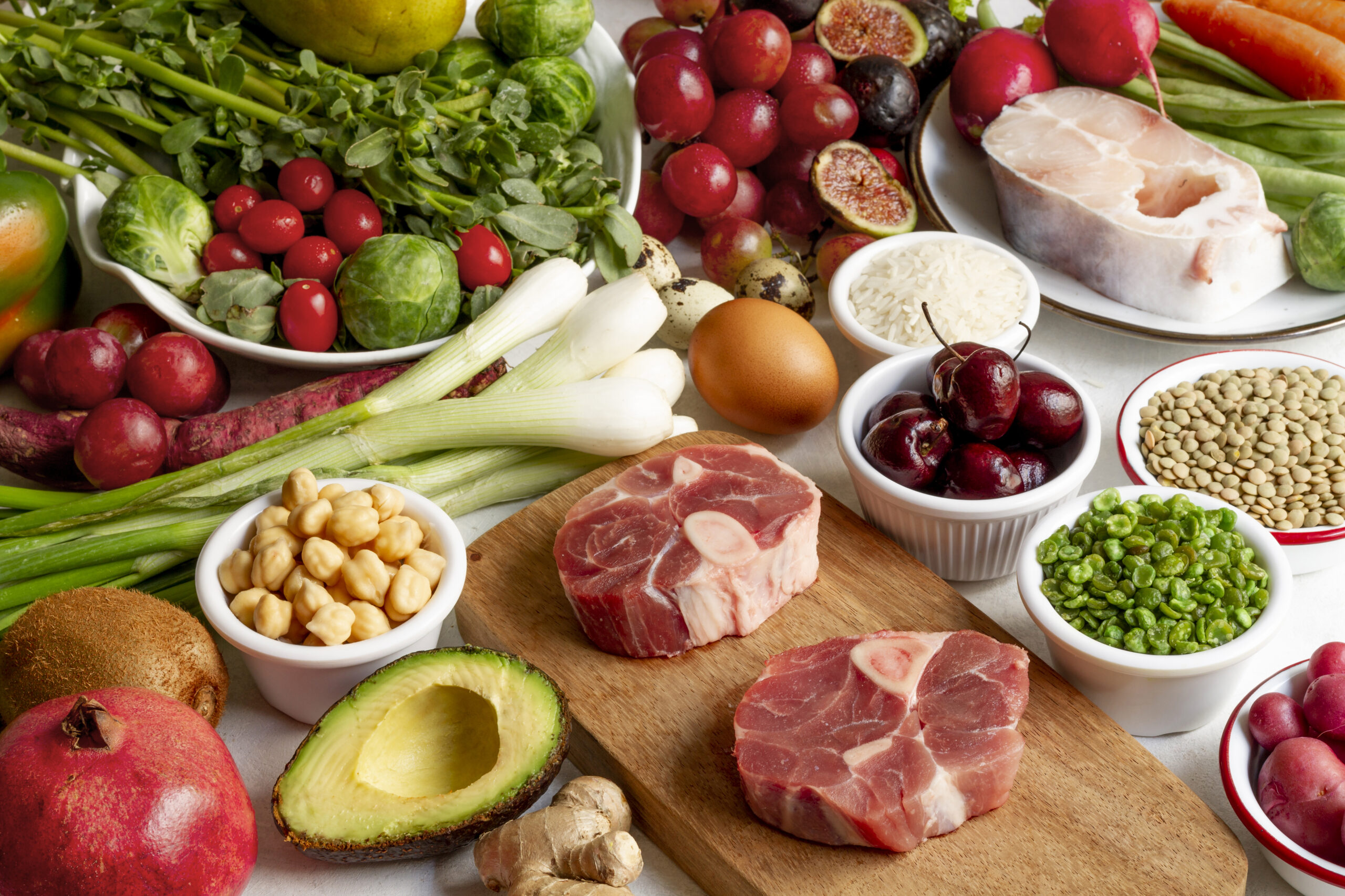 Meat, seafood, and vegetables representing a balanced, whole-food approach to functional wellness and personalized nutrition